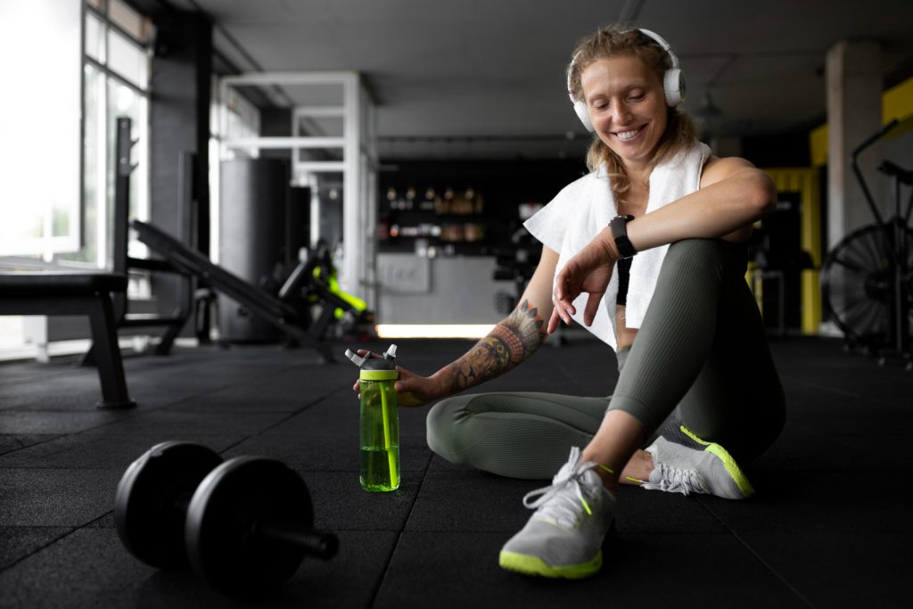 Woman losing weight without starving with good nutrition and diet with a personal trainer in Nottingham