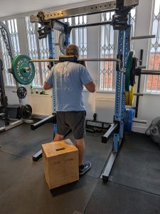 Stephen squatting after injury | Real World Fitness - Nottingham Gym, Personal Training and Sports Massage